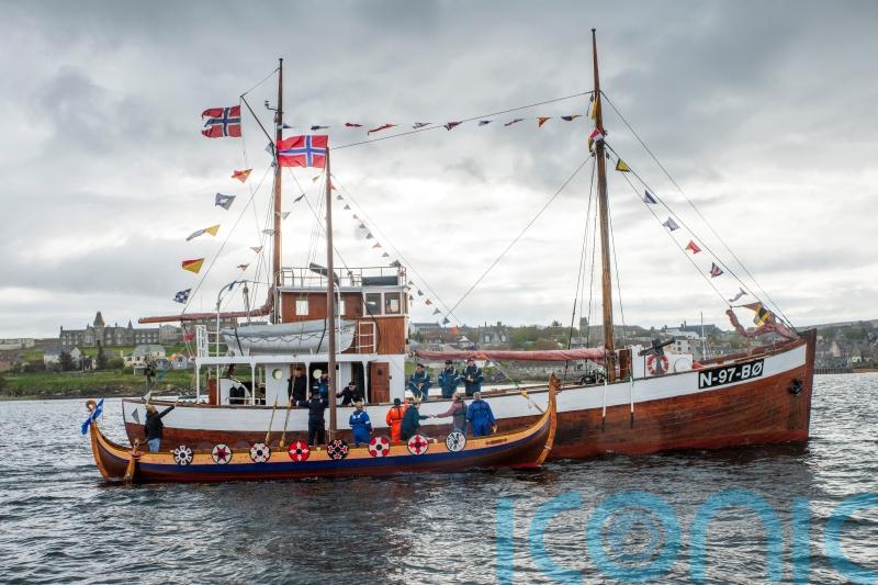 ‘Shetland Bus’ convoy greeted with floating salute as it arrives in Lerwick