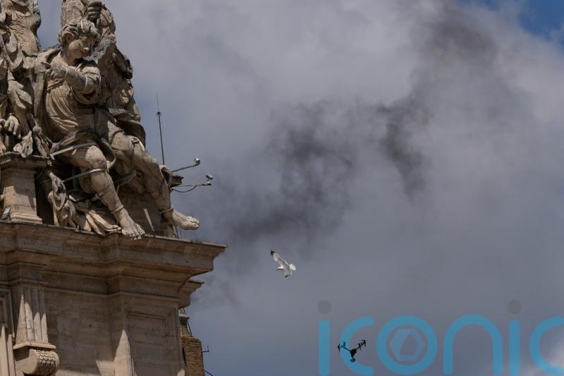 More black smoke from Sistine Chapel signals wait for new pope goes on