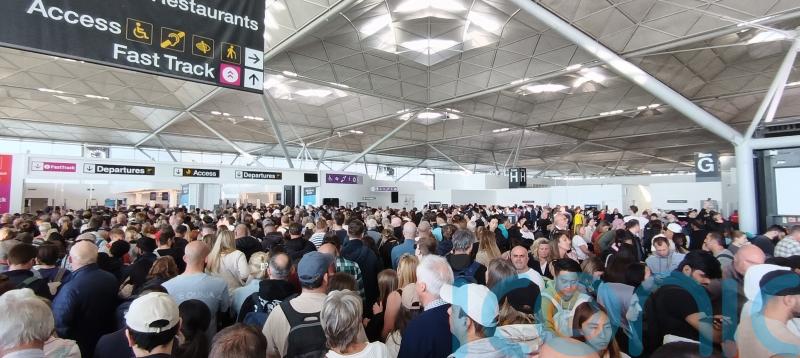 Passengers at Stansted face long delays and disruption after IT glitch