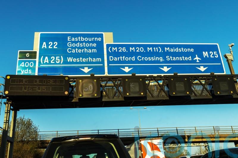 M25 partially closed after waste lorry overturns in collision