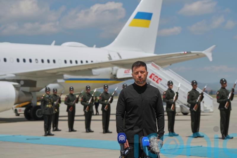 Ukraine’s Zelensky arrives for peace talks but Russia’s Putin stays away