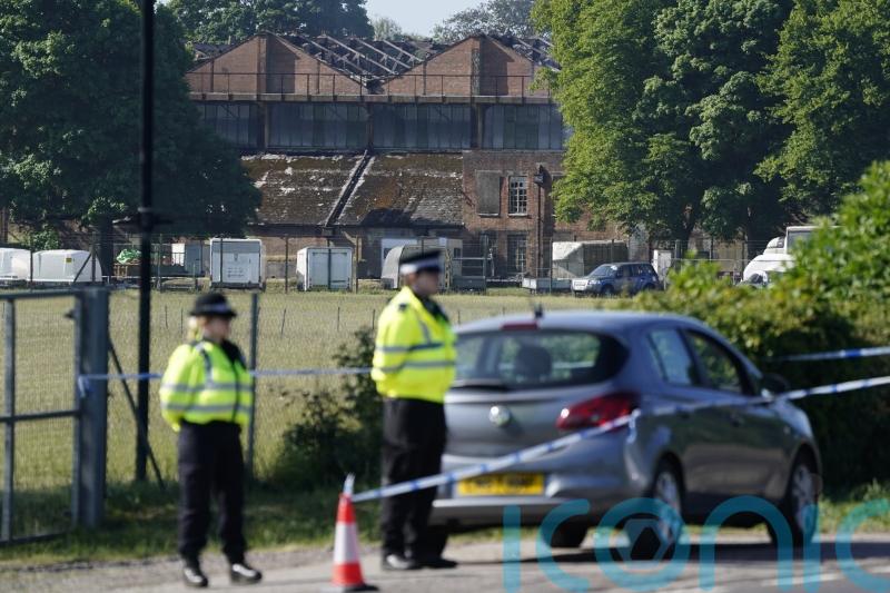 Two firefighters and member of public dead following large fire at ex-RAF base