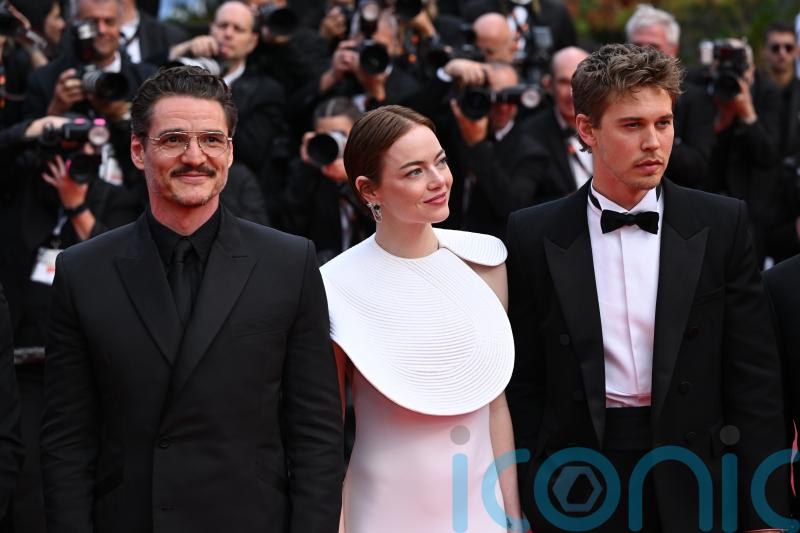 Emma Stone and Pedro Pascal pose on Cannes red carpet for Eddington premiere
