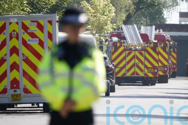 Man and two firefighters killed in fire at former RAF base named