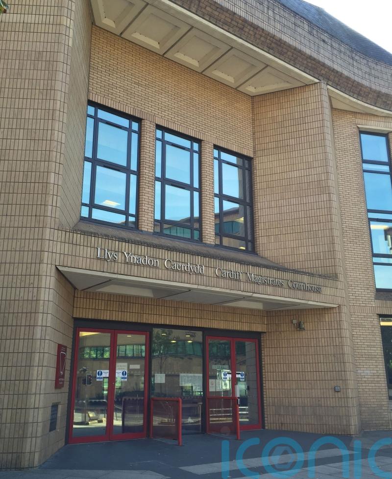Former MP appears in court charged with harassing ex-wife
