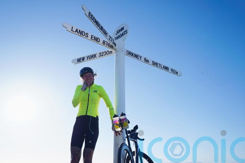 Cyclist with rare condition breaks record for cycling length of UK and back