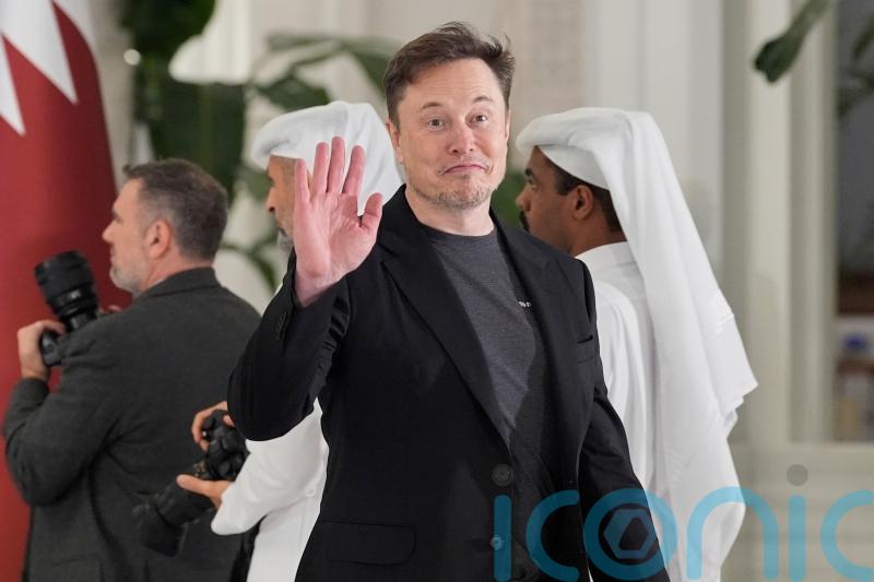 Elon Musk says he is committed to still being Tesla chief in five years’ time