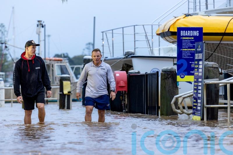 Record floodwaters in eastern Australia leave two dead and two missing