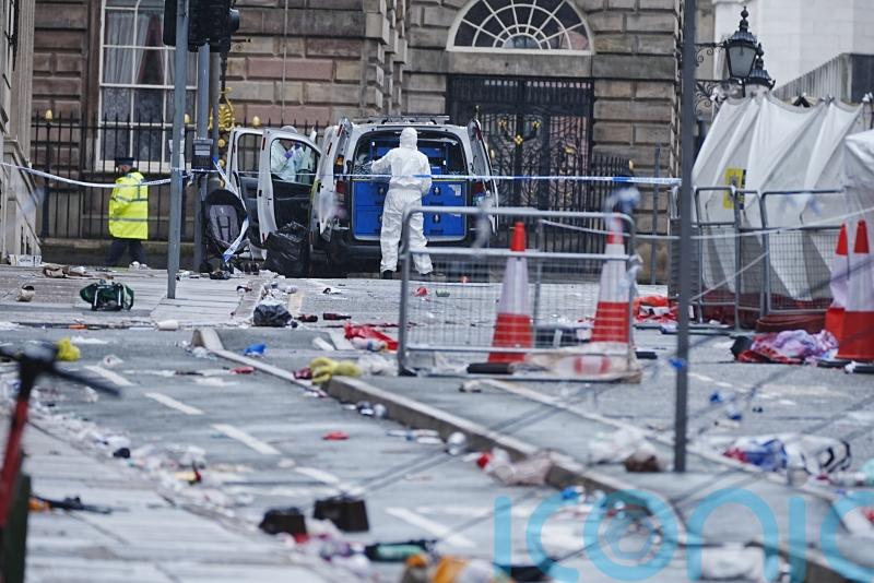 ‘Big question’ over how car was on road before parade incident, mayor says
