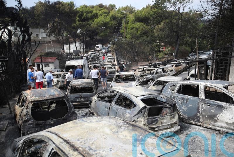 Former top Greek fire officials convicted over deadly blaze