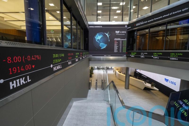 FTSE 100 closes higher after survey shows UK services sector returned to growth