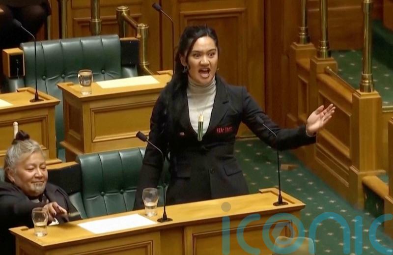New Zealand parliament suspends three Maori Party politicians over haka protest