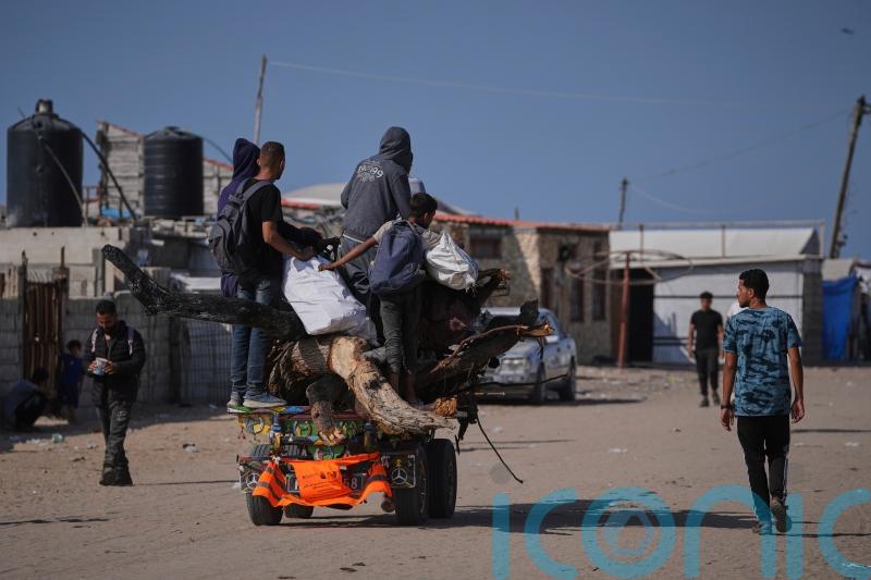 12 killed by Israeli fire near aid points, Palestinians say