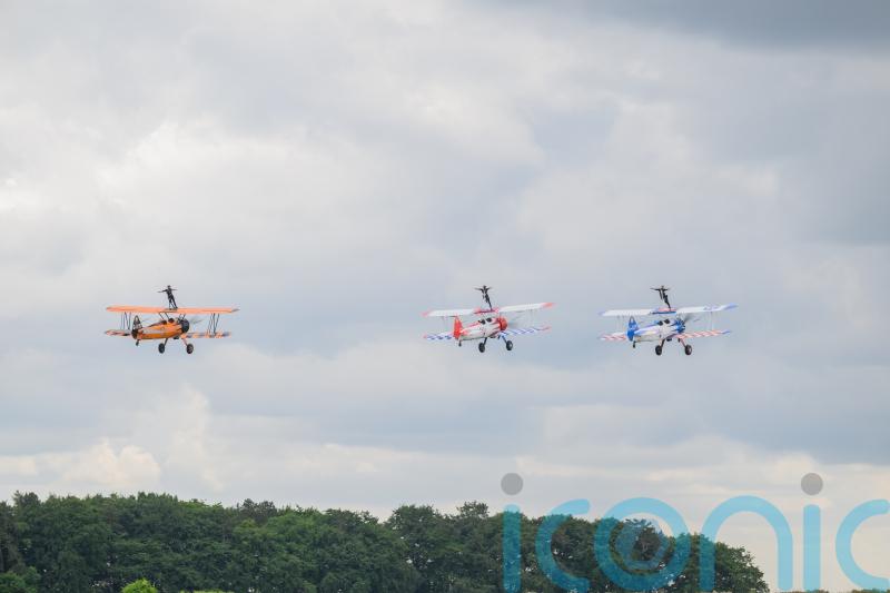 Three granddaughters complete ‘world first’ by flying in formation on three aeroplanes in ‘powerful’ triple wing-walk