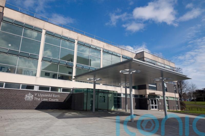 Couple accused of grandson’s murder punched their children, court hears