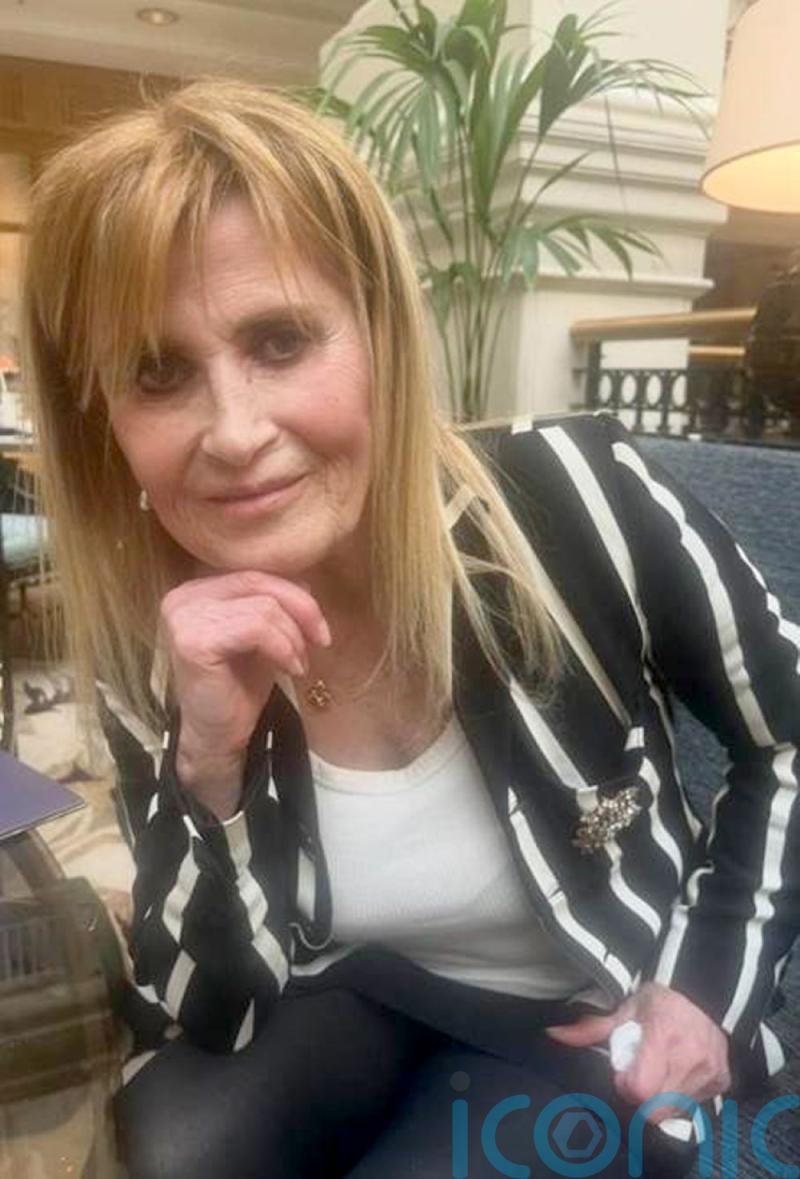 Woman arrested on suspicion of murder after 69-year-old found stabbed at home