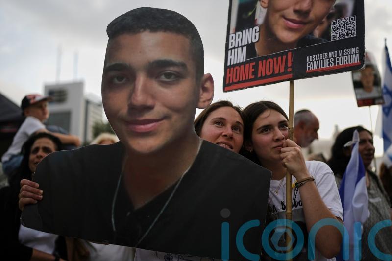 Residents line streets to welcome home Israeli-American hostage