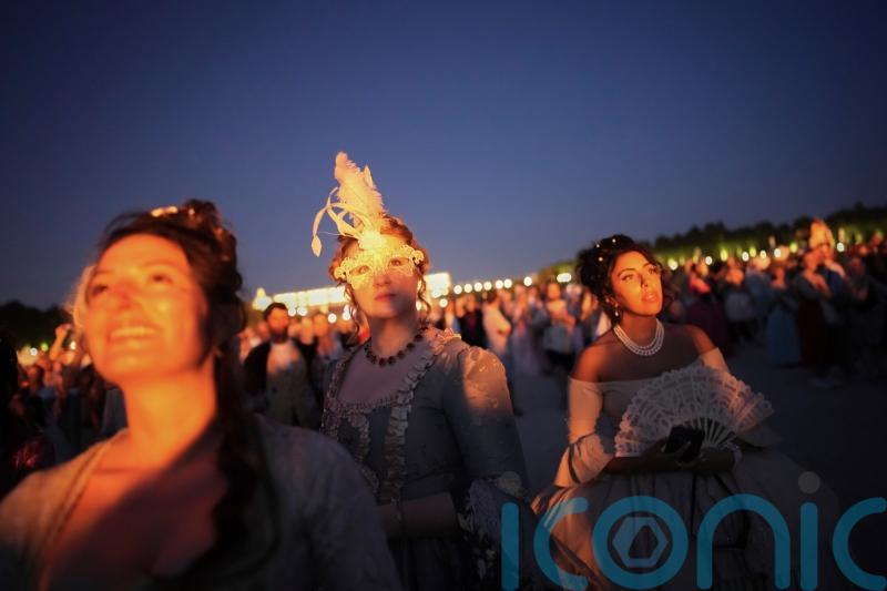 In Pictures: Revellers in baroque costumes dance until dawn at masked ball