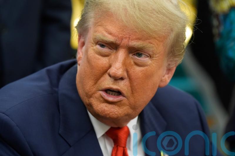 Trump says he is terminating trade talks with Canada over tax on tech firms