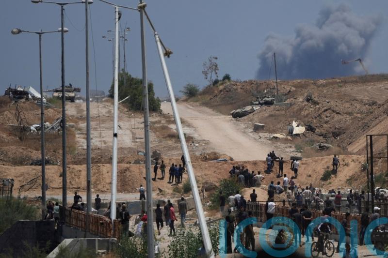 Dozens of people waiting for aid among 94 killed in Gaza, authorities say