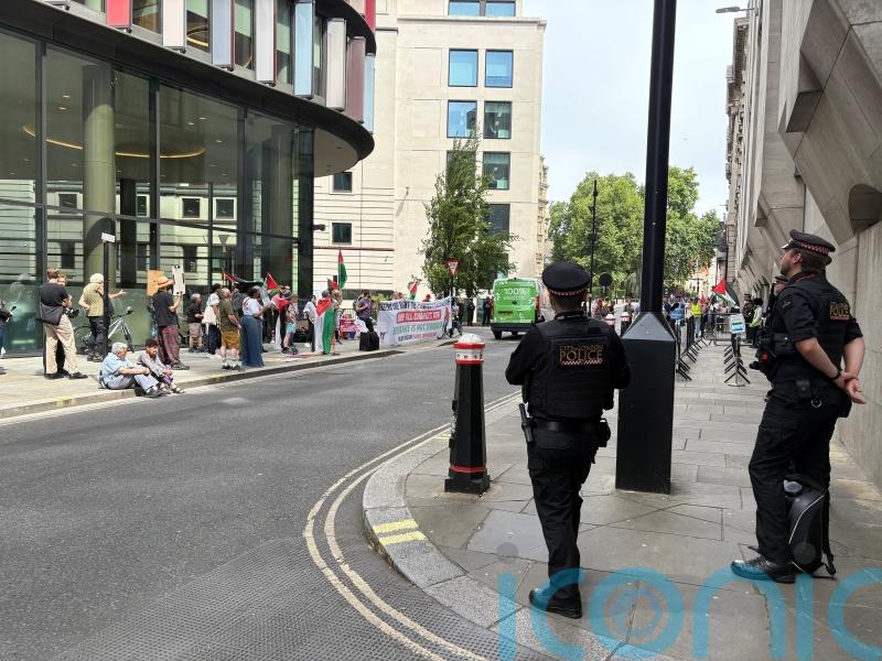 Protesters turn out as woman appears in court over alleged support for Hamas