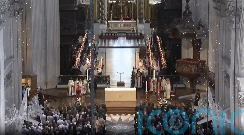 Thousands of petals fall in cathedral as 52 victims of July 7 remembered