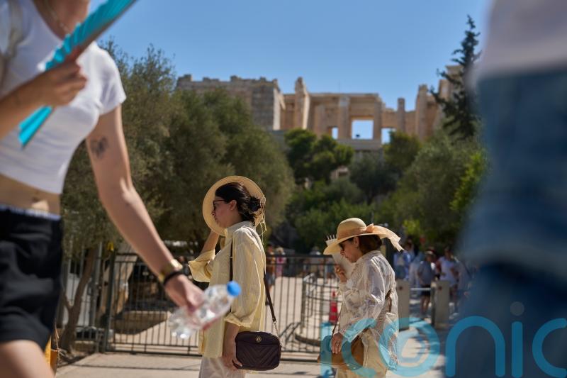 Greece shuts the Acropolis as work restrictions remain amid heatwave