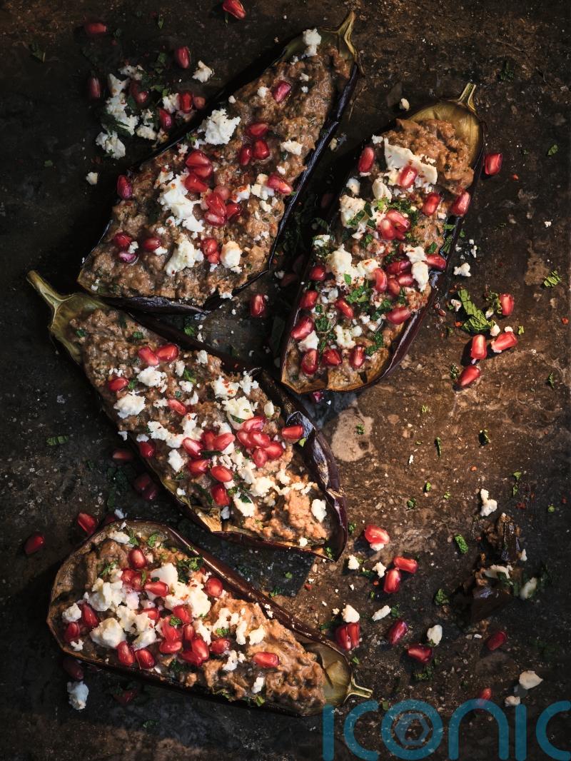 Yasmin Khan’s stuffed aubergine with walnuts, pomegranate and feta