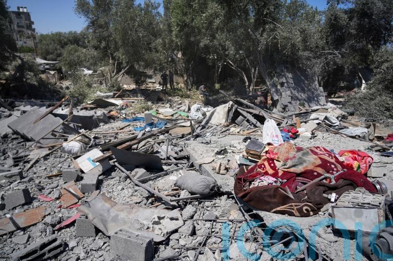 Six children among 10 people killed at water collection point by Israeli strike