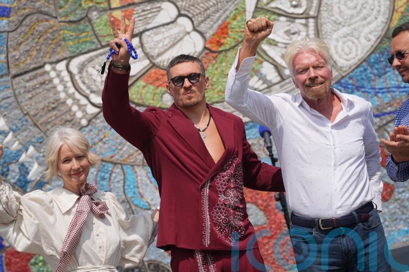 Sir Richard Branson highlights Ukraine conflict at mosaic unveiling