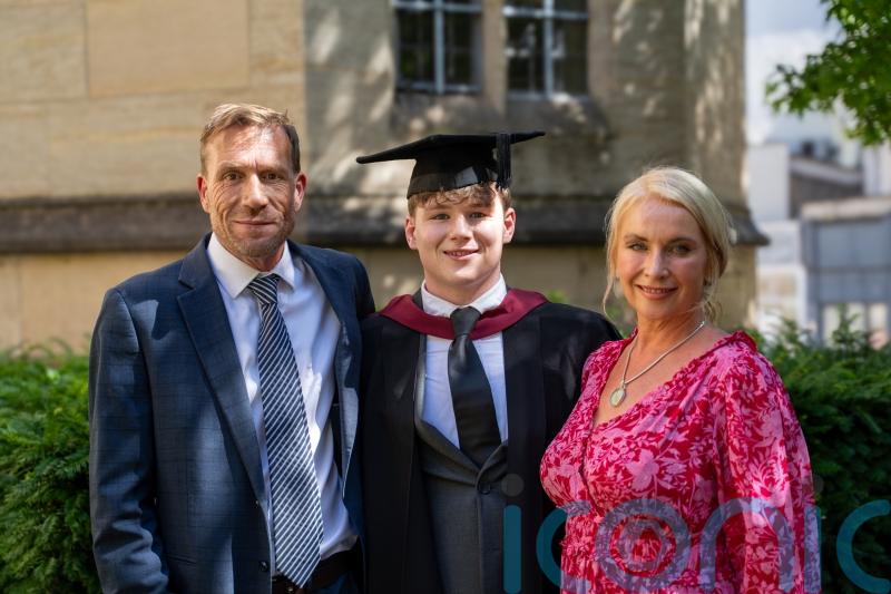 Student overcomes severe spinal injury to graduate with first class degree
