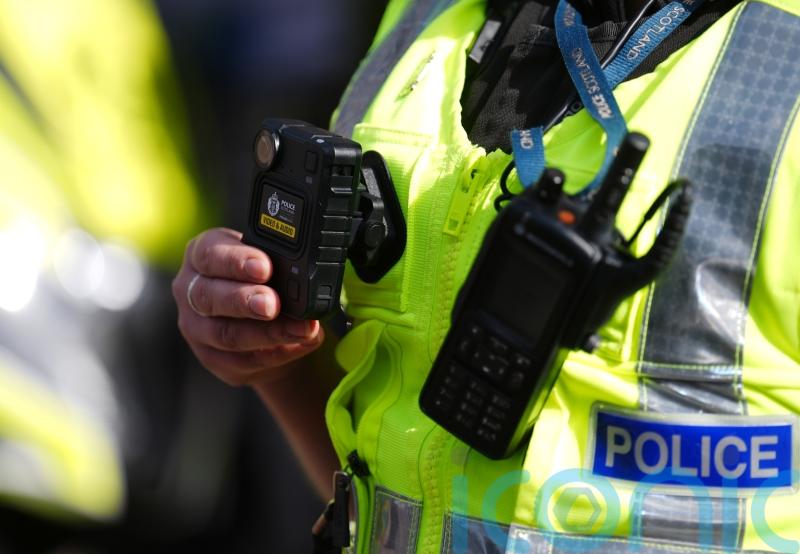 Man arrested after ‘displaying terror group poster in his window’