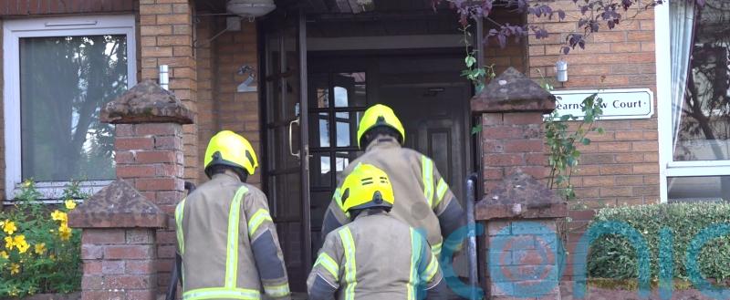 Fire crews tackle blaze at sheltered housing complex