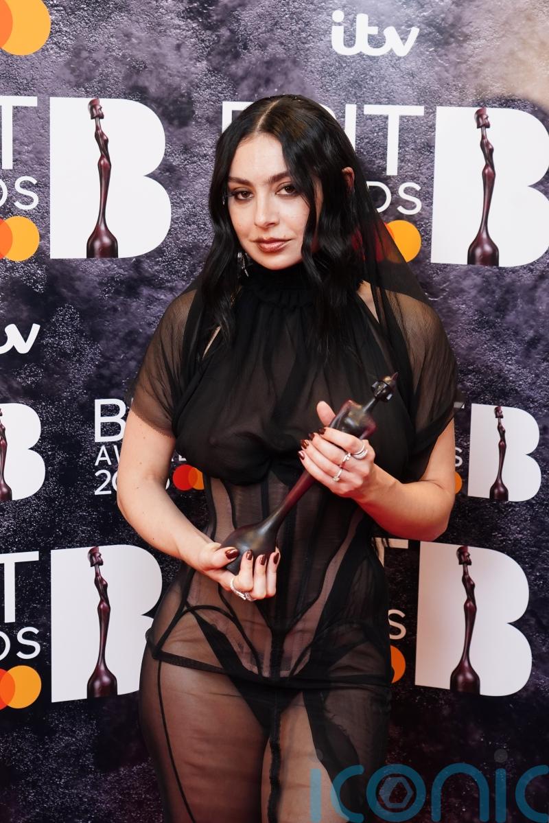 Brat star Charli XCX confirms marriage to The 1975 drummer George Daniel