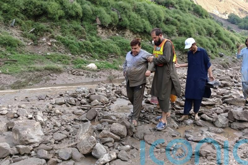 Flash floods sweep away vehicles carrying tourists in northern Pakistan