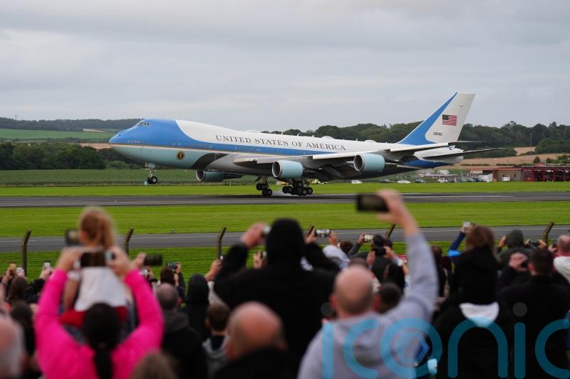 US President Donald Trump arrives in Scotland