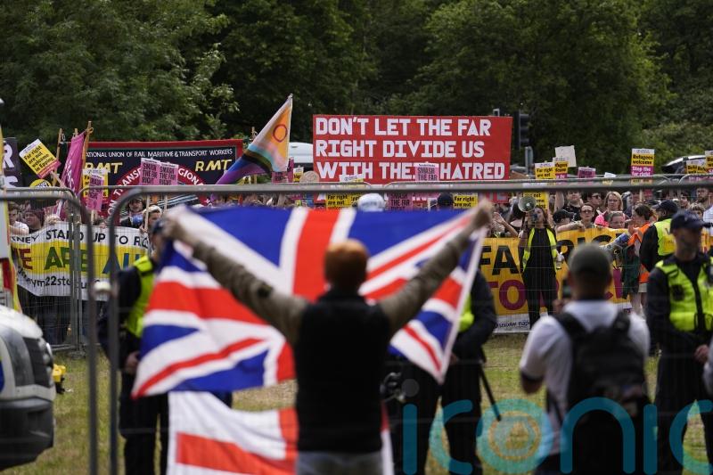 Protesters stage demo outside hotel used to house migrants