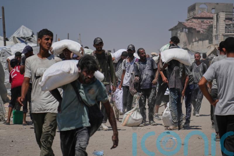 At least 78 killed amid Israeli strikes in Gaza as some aid restrictions eased