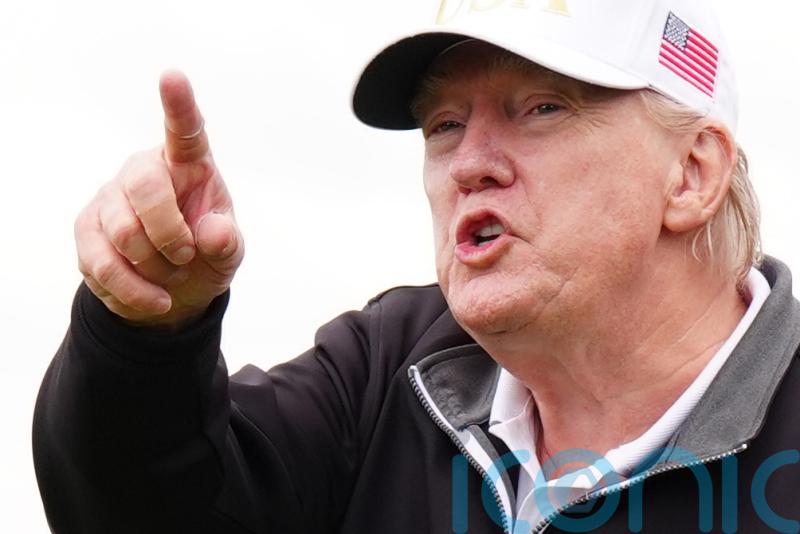 Trump opens his new Scottish golf course before return to US to ‘put out fires’