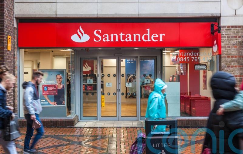Santander axes 2,000 jobs and warns more cuts are possible