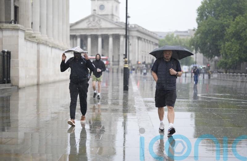 Heavy showers hit parts of UK after thunderstorm warning issued