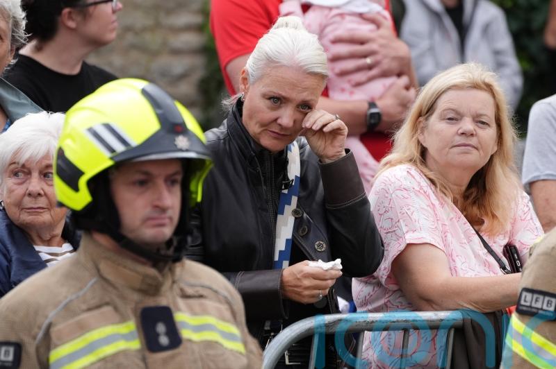 Fire crews and mourners line streets to honour fallen firefighter Martyn Sadler