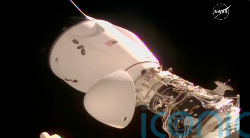 SpaceX delivers new crew to orbiting station in just 15 hours