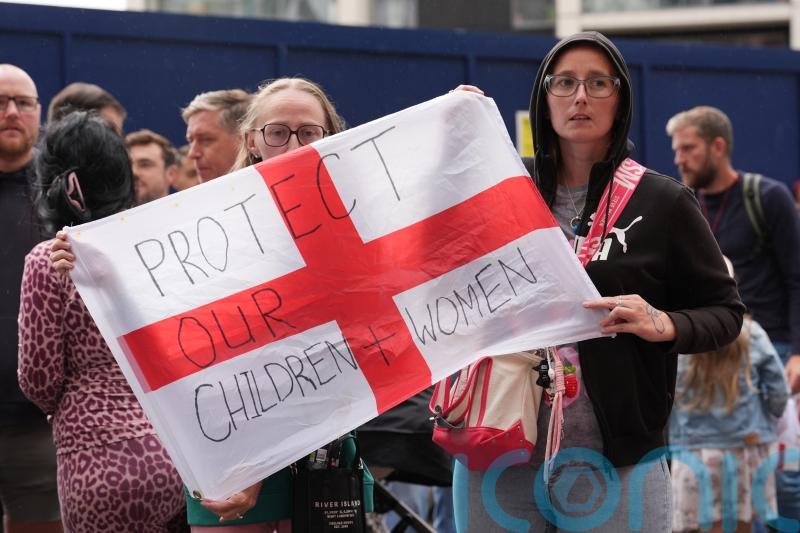 Protesters tried to break into Canary Wharf asylum hotel, police say