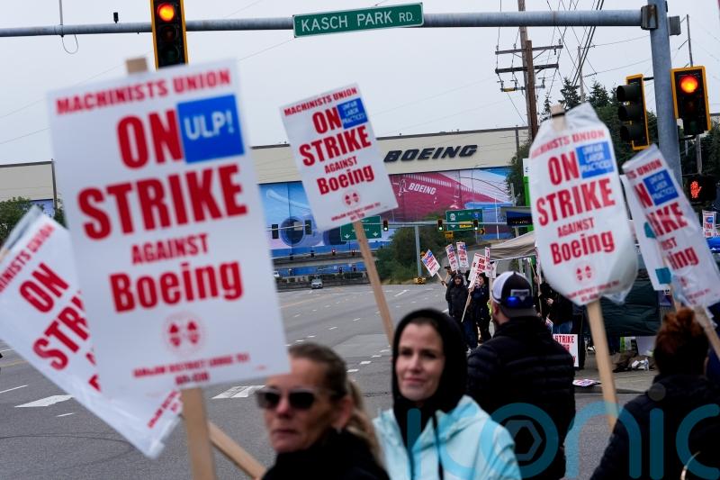 Thousands of Boeing workers who build fighter jets and weapons go on strike