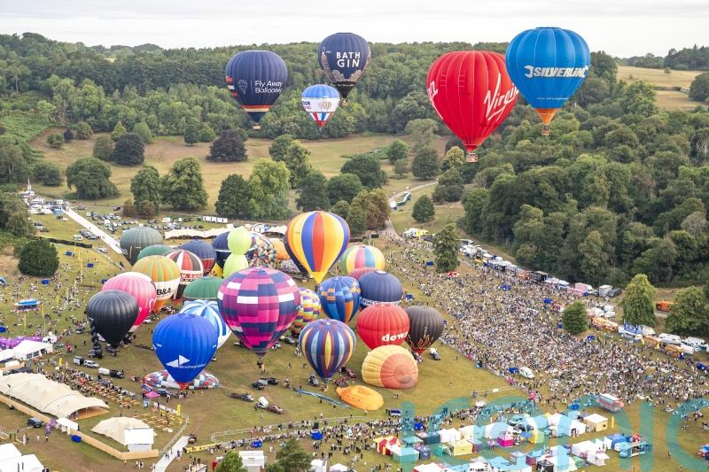 Dozens of hot air balloons take to the skies above Bristol