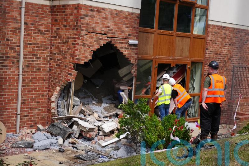 Driver admits causing serious injury after crashing stolen car into care home