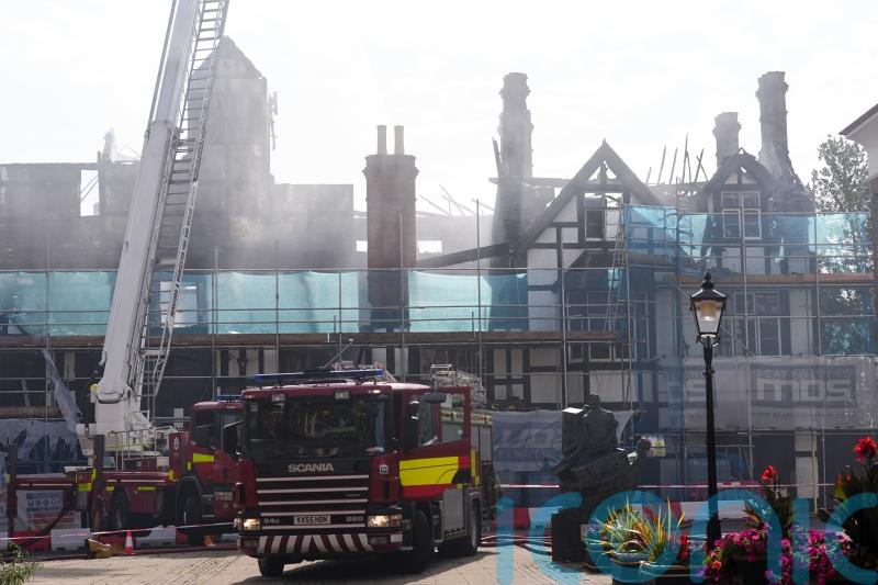 Two girls arrested after historic hotel destroyed in suspected arson attack