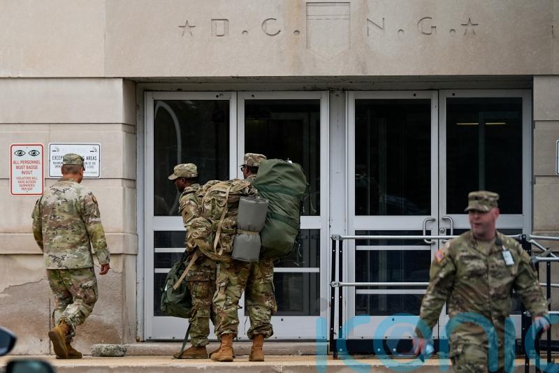 Trump’s Washington takeover begins as National Guard troops arrive