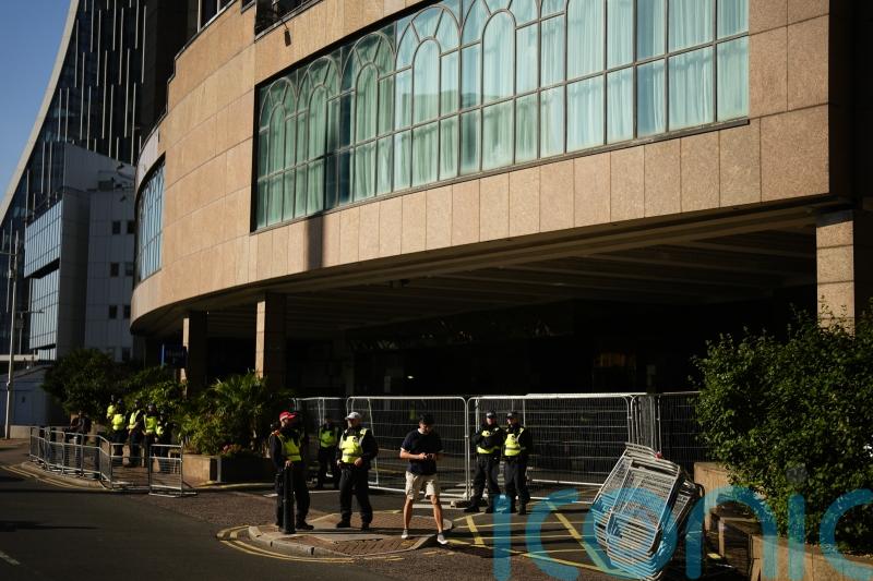 Woman charged with assault after migrant ‘walked into her flat’